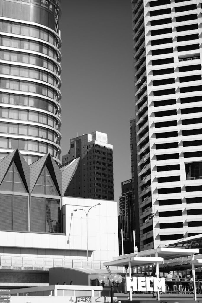 modern-urban-landscape-with-skyscrapers-35218949 Black and white photo of modern skyscrapers in an urban cityscape.